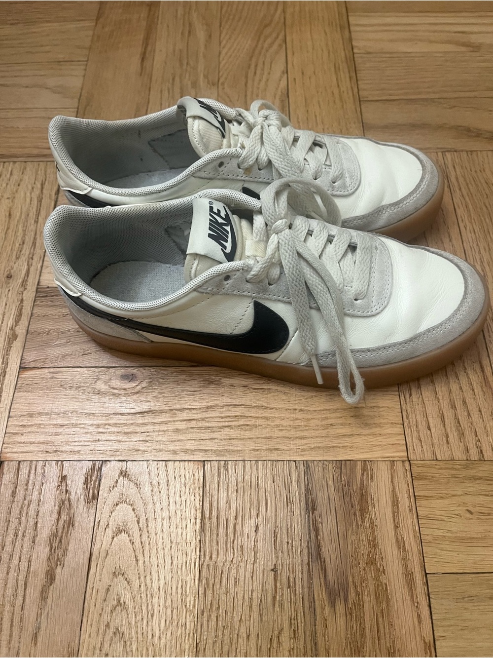 Nike Women’s White Sneakers with Black Swoosh and Gum Sole